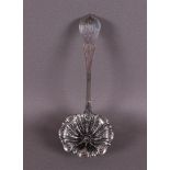 A first grade silver sugar sprinkle spoon with hammered handle, late 19th centur