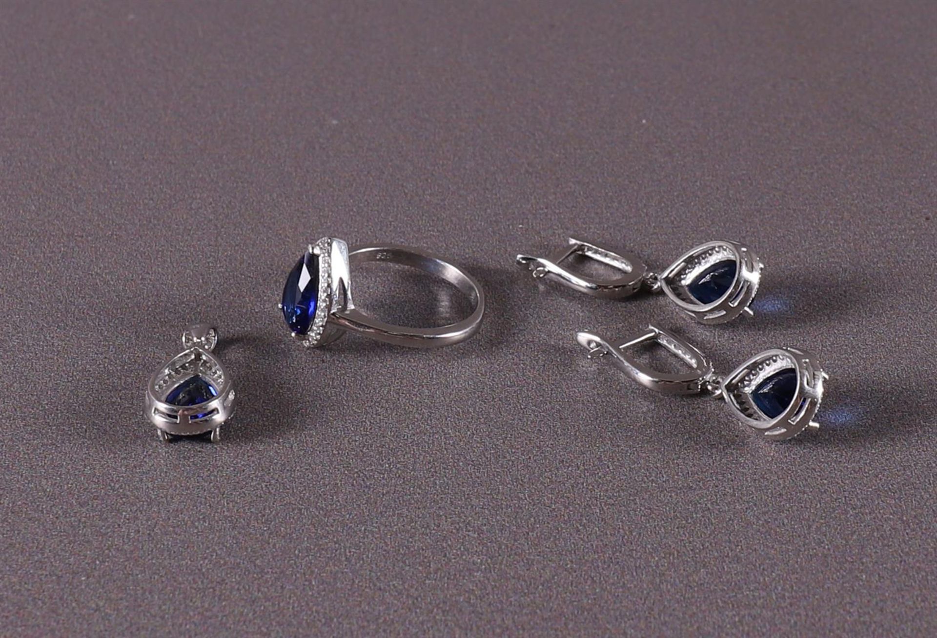 A 1st grade silver ring, earrings and pendant with blue stones - Image 3 of 3