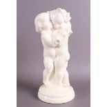 A white glazed earthenware molding of two putti, Austria, 20th century.