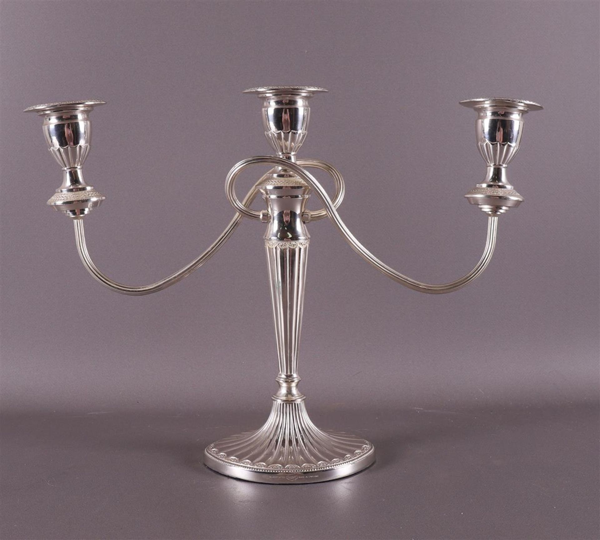 A silver plated 3-light candlestick, Empire style, 20th century.