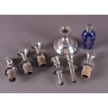 A lot of various silver, including candlestick and perfume bottle.