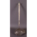 A silver sauce ladle on a bone handle, Germany, 1st half 19th century.