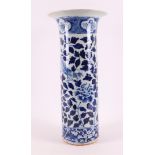 A cylindrical blue and white porcelain trumpet vase, China, 19th century.