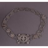 A silver so-called 'Nurses belt' with hammered buckle. Collins and Cook,