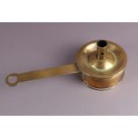 A brass sconce with tinder box, England 18th century.