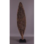 A wooden paddle blade, Sentani style, Papua New Guinea.