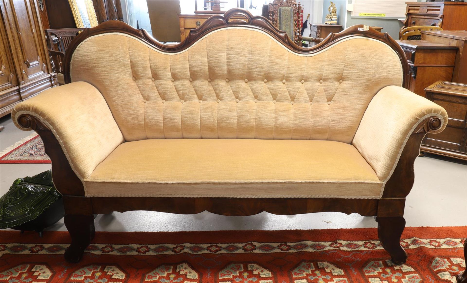 A three seater sofa with pink fabric upholstery, Holland, mid 19th century.