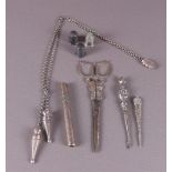 Various mainly silver sewing utensils, including needle case and scissors, 19th/
