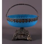 A blue glass bowl on a silver base, 19th century.