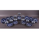Nine blue and white porcelain cups and eleven saucers, China, Kangxi, around 170