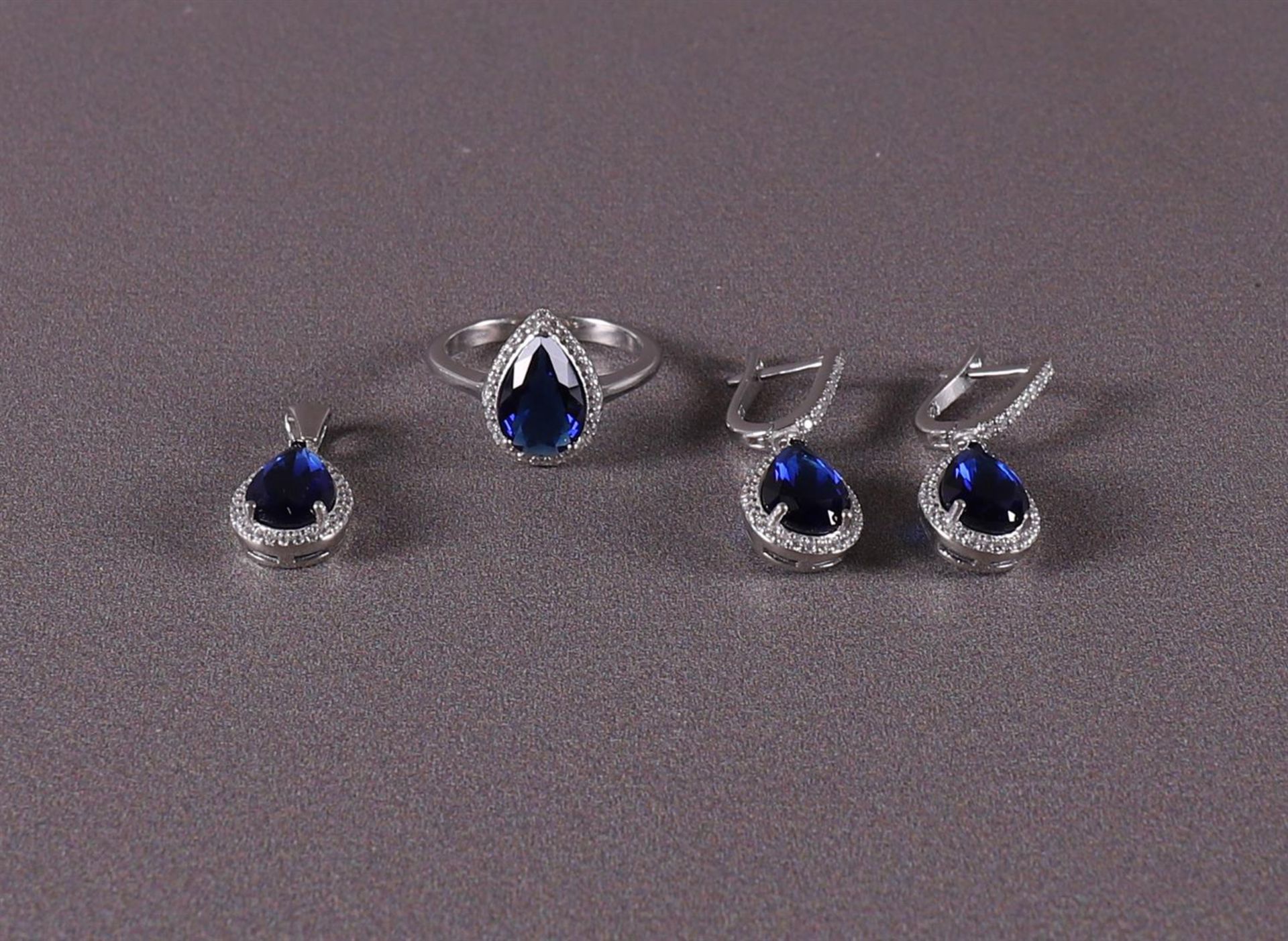 A 1st grade silver ring, earrings and pendant with blue stones - Image 2 of 3