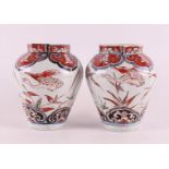 A pair of octagonal porcelain Imari vases, Japan, Edo 18th century.