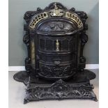 A cast iron stove 'Coquette' on bottom plate, marked: E.M. Jaarsma, ca. 1900
