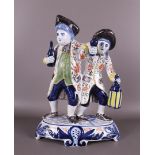 Earthenware molding of two drinking men, after an antique example, 20th century