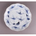 A blue and white porcelain dish, Japan, Meiji, 19th century.