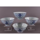 Four blue and white porcelain bowls on stand ring, China, early 19th century.