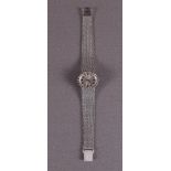 An Ogold women's wristwatch in 14 kt 585/1000 white gold case and strap.