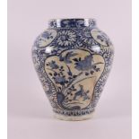 A blue and white cream paste porcelain baluster vase, Japan, Edo, 18th century.