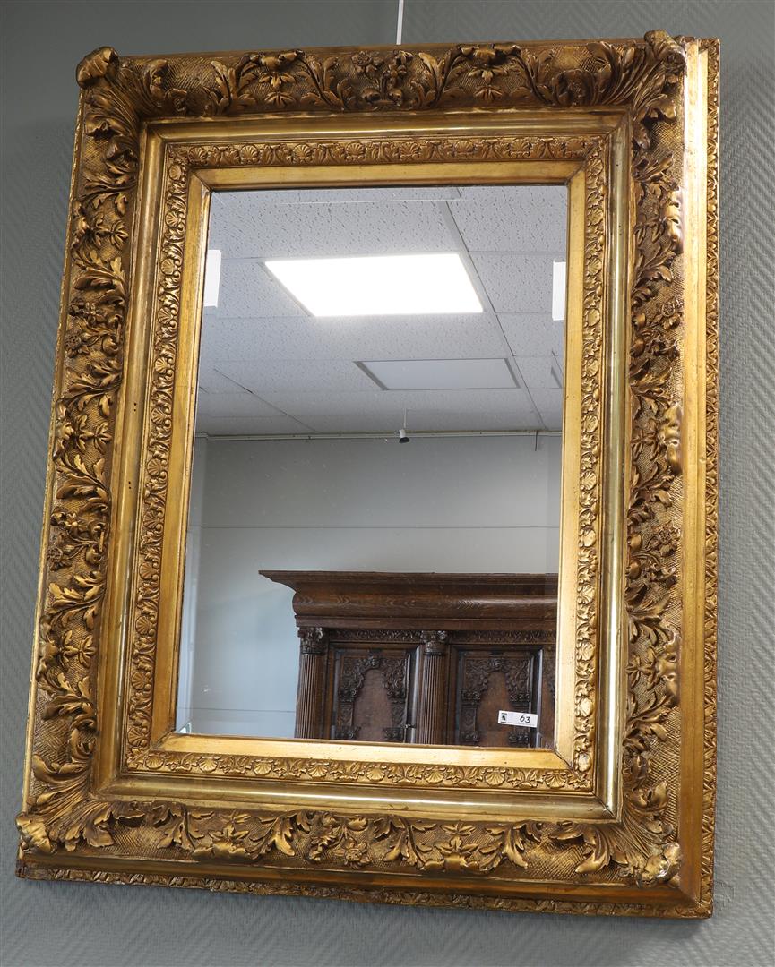 A faceted mirror in a gilded ornamental frame, 1st half 20th century. - Image 2 of 2