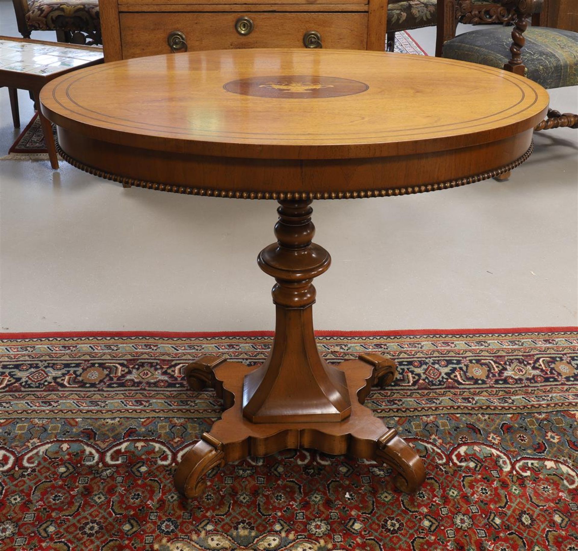 An oval coffee table, 19th century.