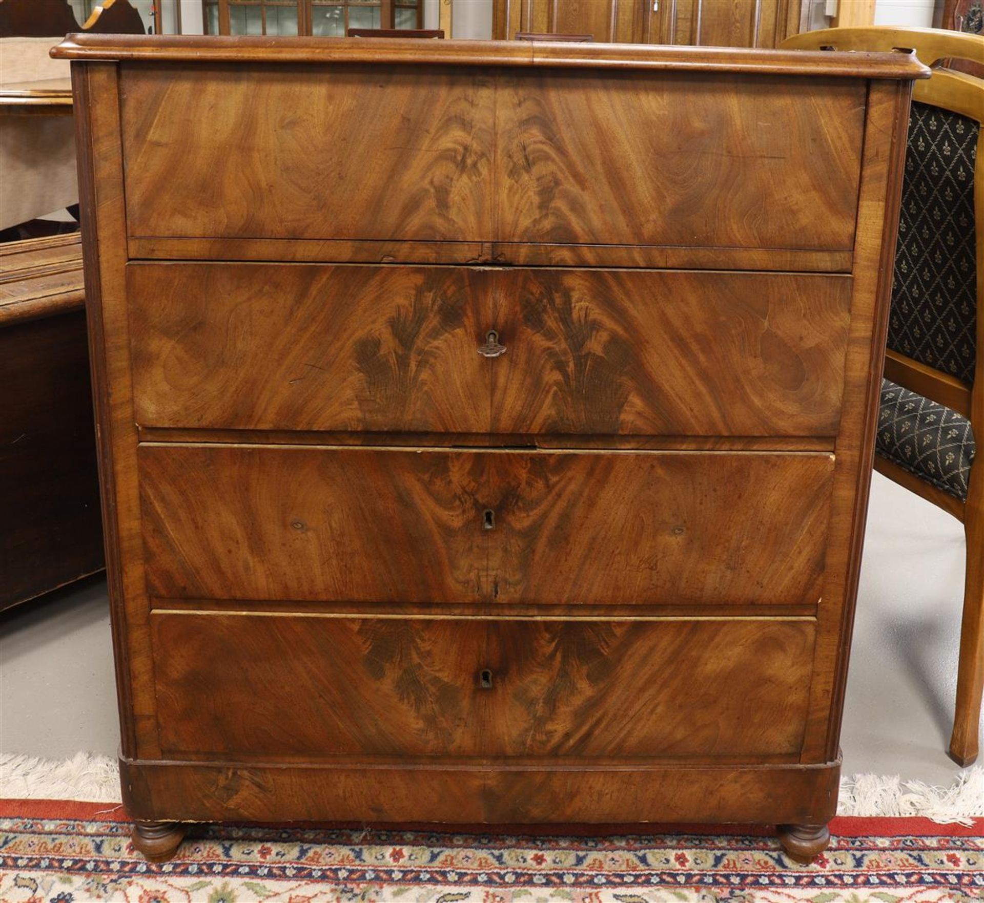 A four-drawer commode, 19th century.