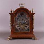 A table clock in burr walnut case, 2nd half 20th century.