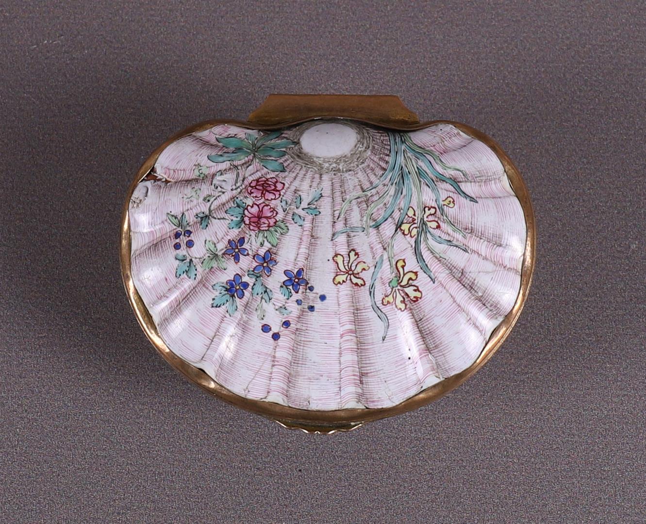 A brass and enamel shell-shaped tobacco box, circa 1800.