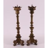 A pair of bronze one-light candlesticks, 20th century.