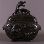 A brown patinated koro with dragon heads for ears, China, 2nd half 19th century.