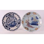 A polychrome Delftware plate with Chinoise decor, 18th century