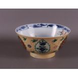 A porcelain famille verte bowl with 'cafè au lait' fond China, Kangxi,