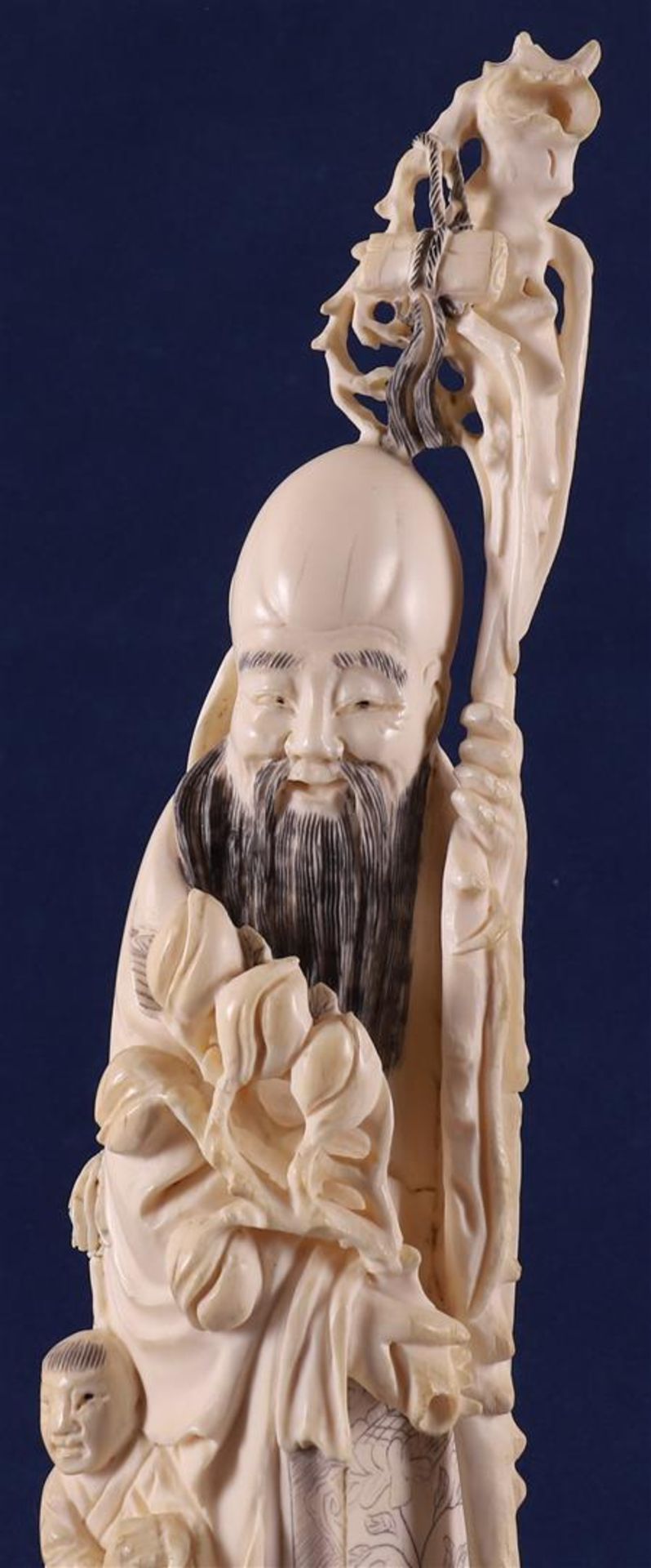 A carved ivory Shou Lao with staff and peaches in his hand, at his side a fool on a crane, China, - Image 2 of 14