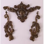 A three-piece bronze furniture fitting, Holland 19th century, to. 3x.