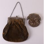 A second grade 835/1000 silver bag bracket on a fabric bag, 1st half 19th century. Here's another