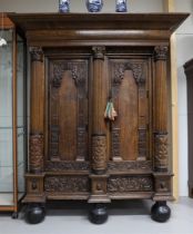 A two-door Keeftkast, Holland, Renaissance, Groningen 17th century. Profiled hood, panel doors
