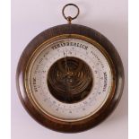 A round barometer in mahogany case, Germany, ca. 1920, Ø 18 cm.