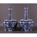 A pair of blue/white porcelain tulip vases, China, 19th century. Blue underglaze decor of