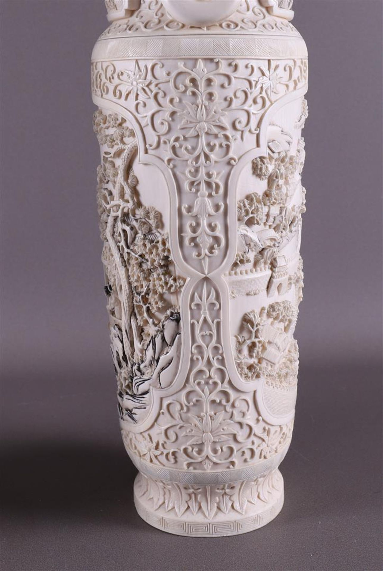 A pair of carved ivory baluster-shaped lidded vases with ringed lion heads as ears, China, Qing - Image 19 of 28