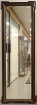 A rectangular facet cut mirror in a profile frame, late 19th century, h 206 x w 68 cm.