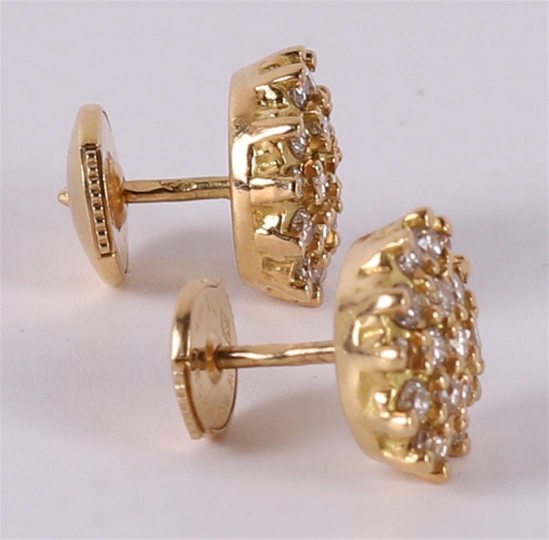 A pair of 18 kt 750/1000 gold stud earrings with 38 diamonds of a total of 0.80 crt H-SI. - Image 2 of 2