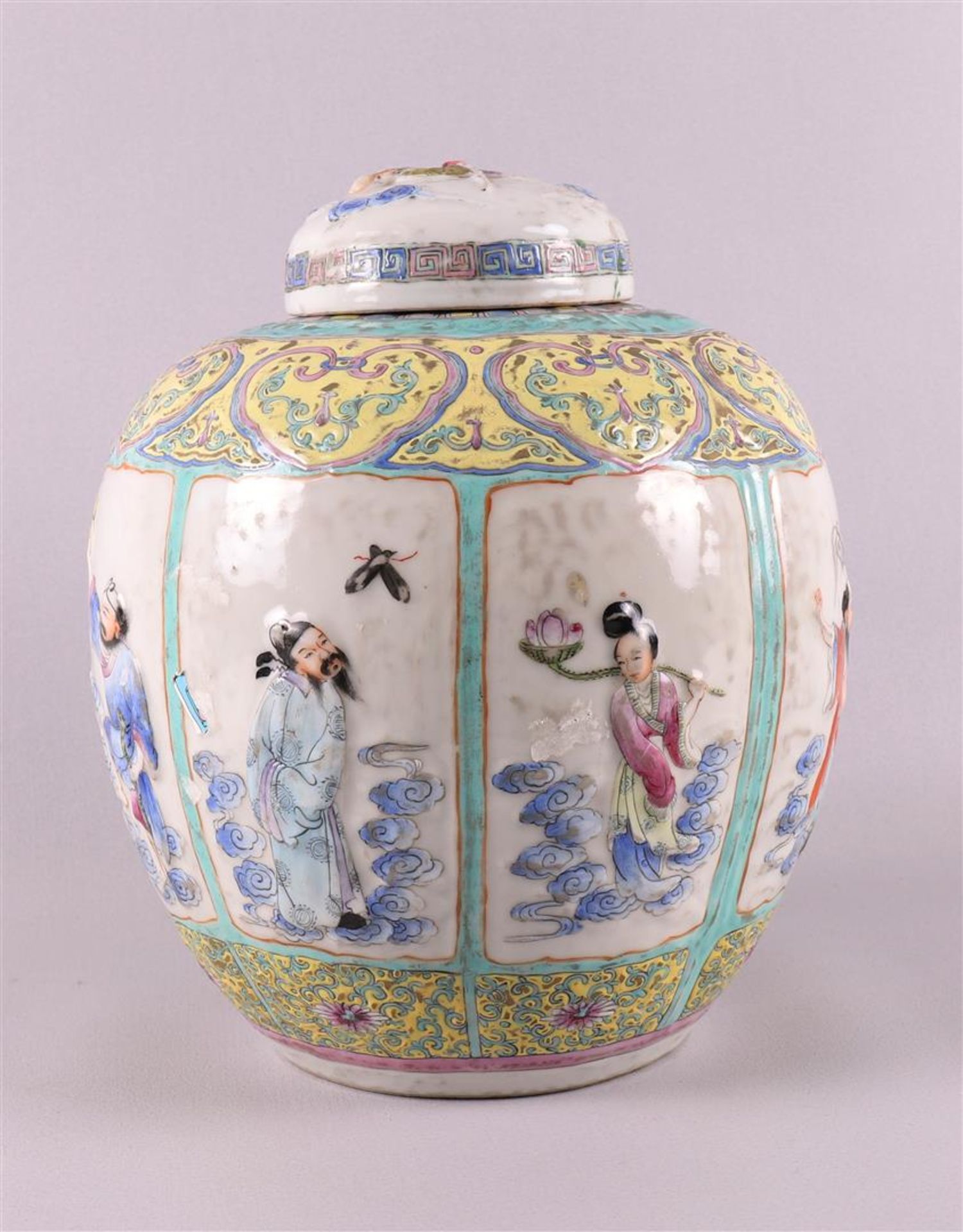A porcelain ginger jar, China, around 1900. Polychrome relief decoration of figures in cartouches - Image 4 of 8