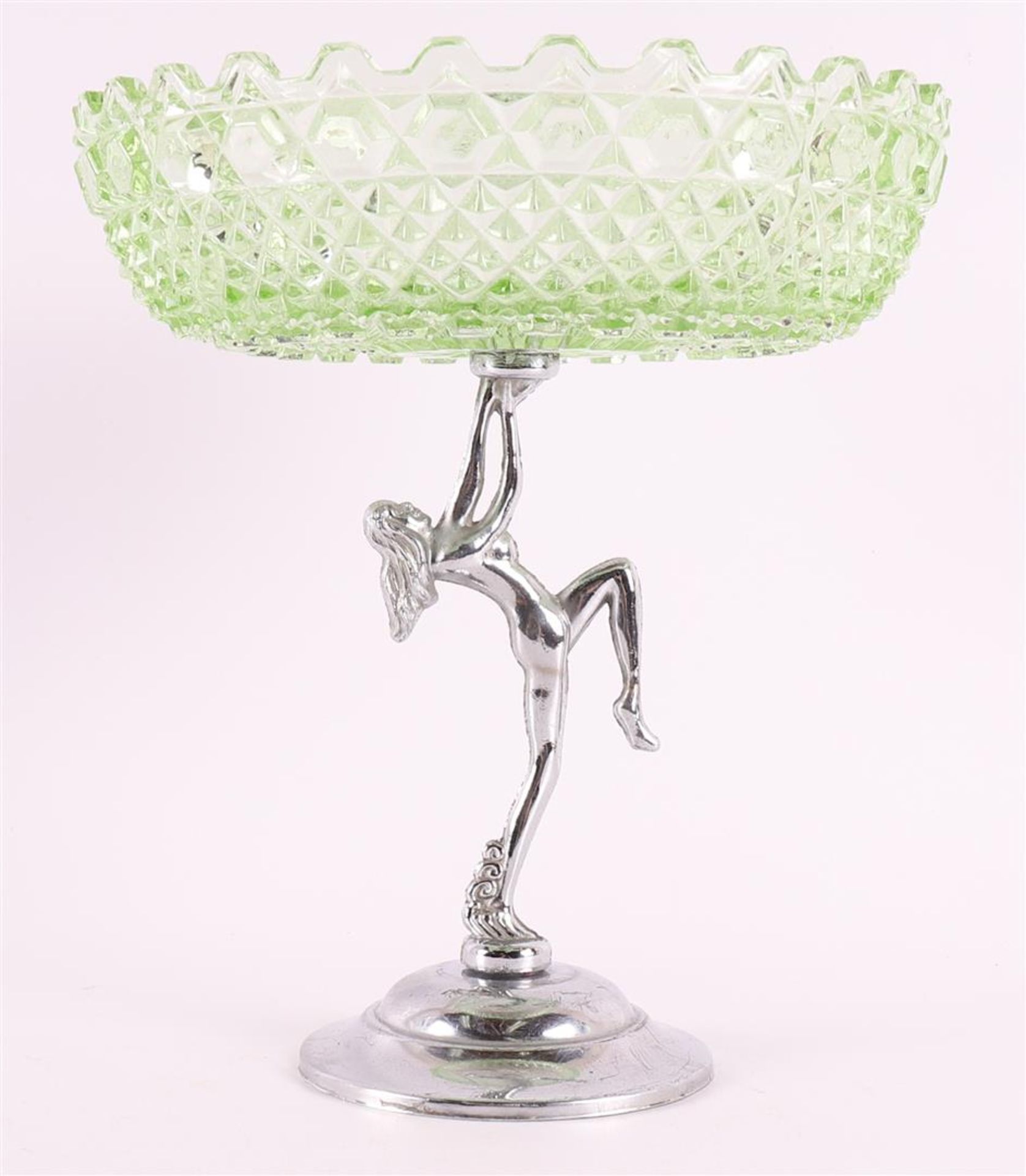 A green pressed glass Art Deco tazza on chrome metal base in the shape of a dancer, France, ca.