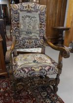 A walnut armrest armchair with gros-point upholstery, Louis XIV style, 19th century, h 124 x w66 x