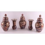 A five-piece porcelain Imari cabinet set, consisting of: three lidded vases and two vases with