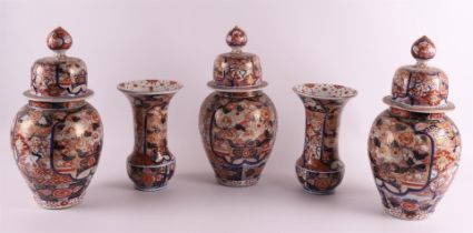 A five-piece porcelain Imari cabinet set, consisting of: three lidded vases and two vases with