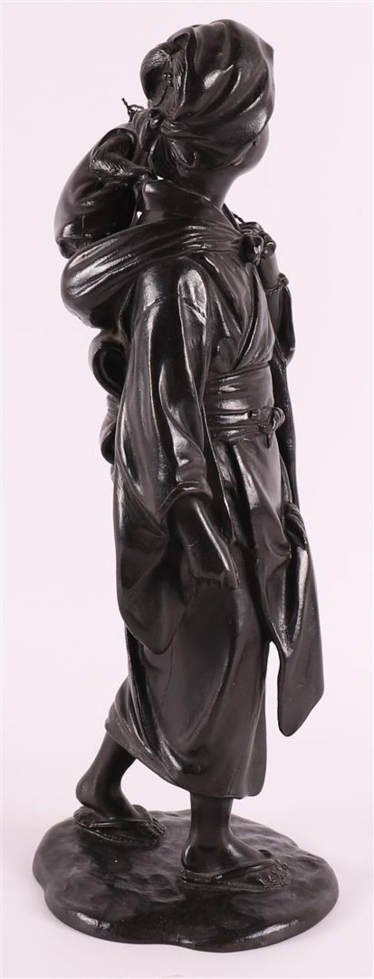 A dark patinated bronze okimono of a woman with a monkey on her shoulder, Japan, 1st half of the - Image 4 of 4