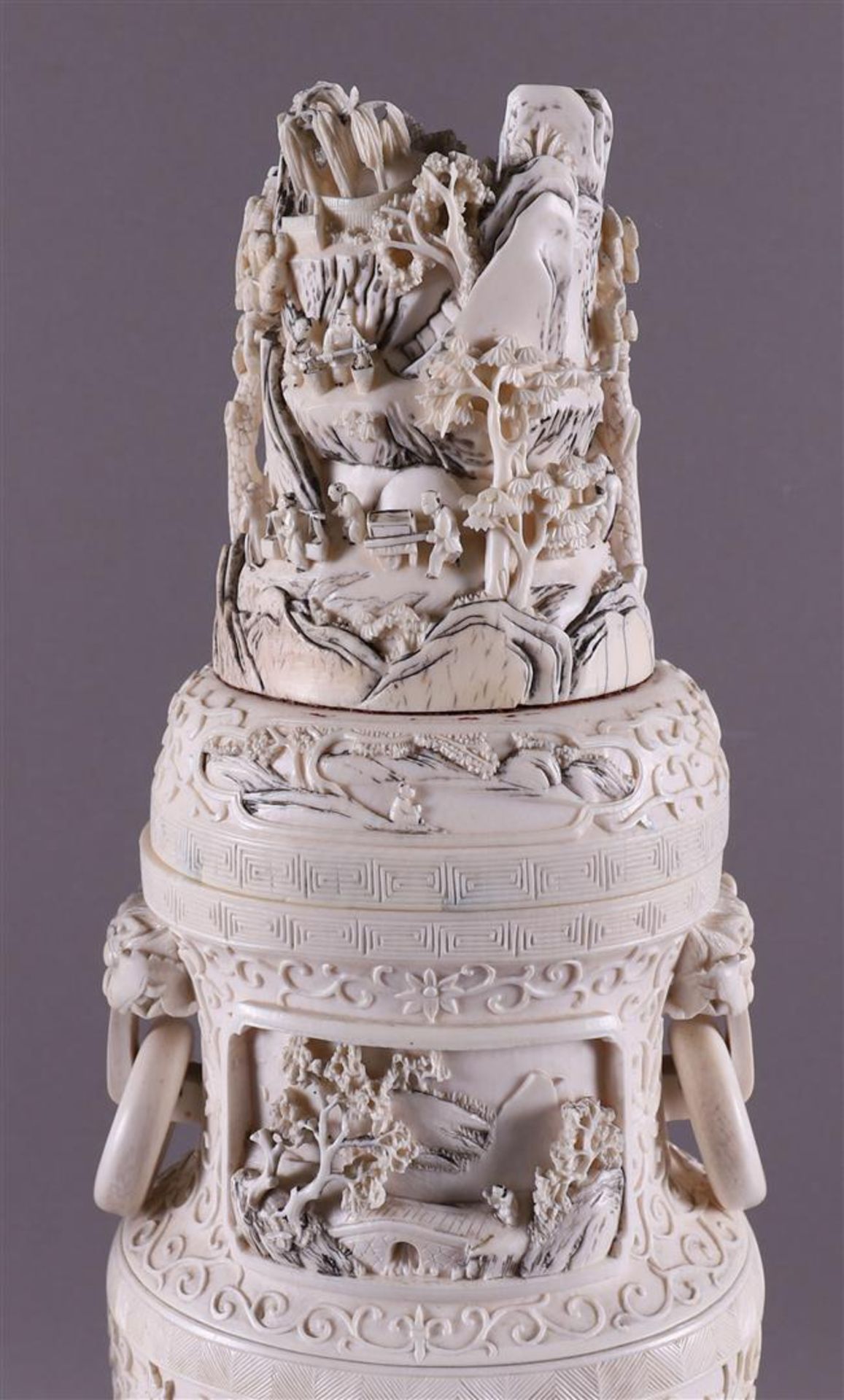 A pair of carved ivory baluster-shaped lidded vases with ringed lion heads as ears, China, Qing - Image 5 of 28