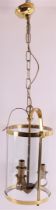 A cylindrical glass hall lamp in a brass frame, after an antique example, France, 2nd half of the