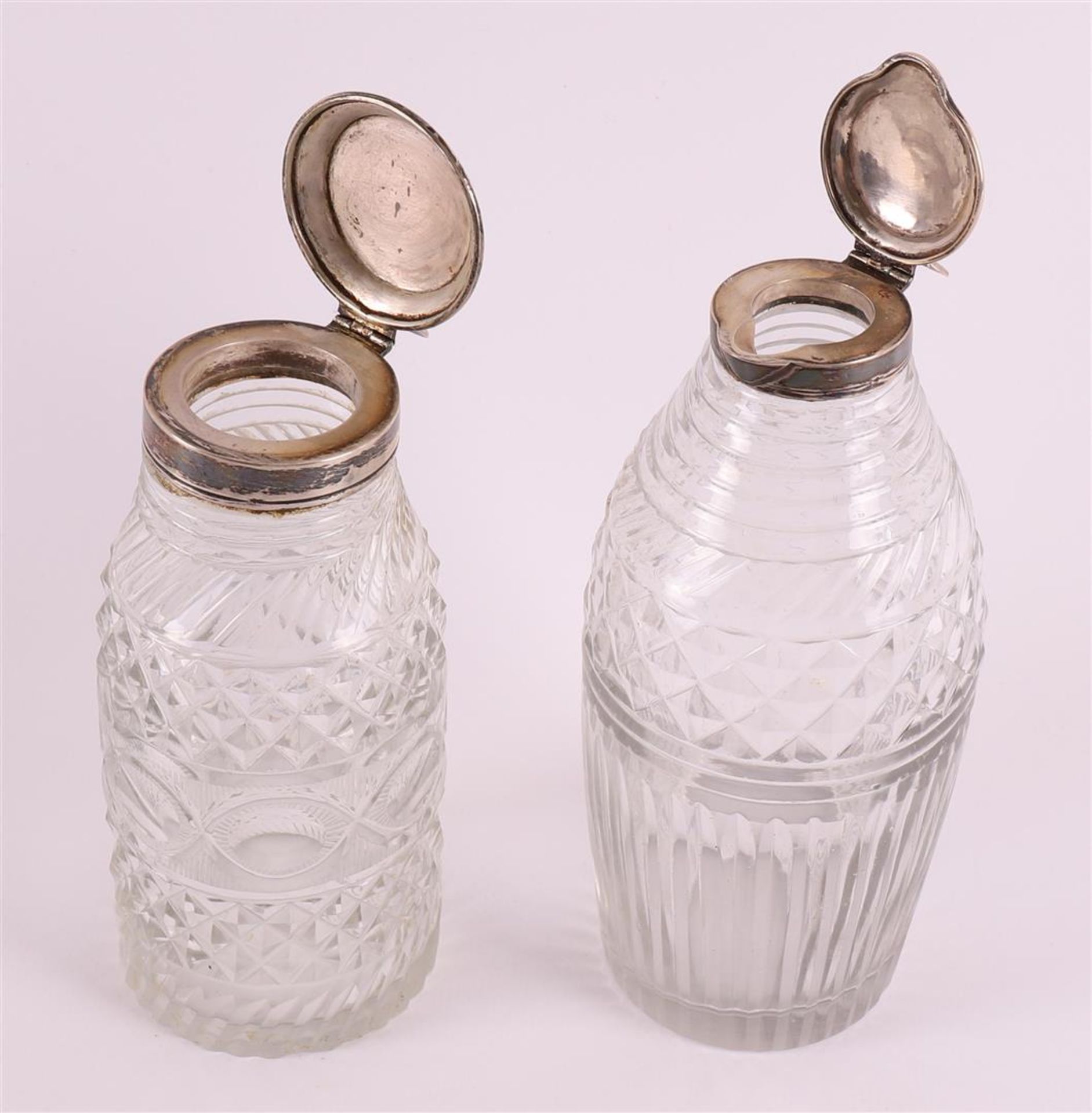 Three silver orchid vases, 20th century. Here are two clear crystal jugs with silver frames, up - Image 4 of 4