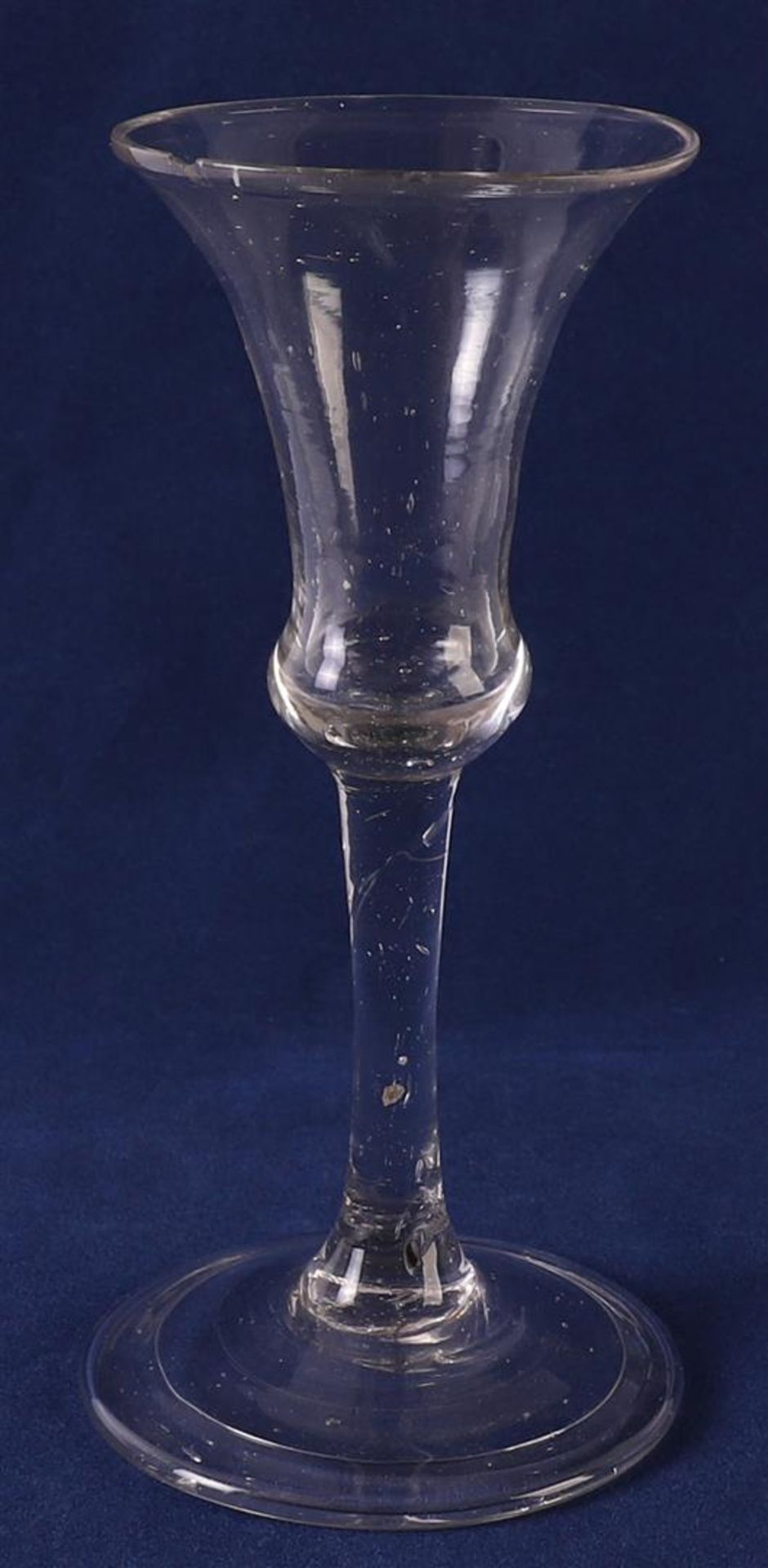 A glass, Holland, 18th century. Tulip-shaped cuppa, straight stem, resting on round base, h 16 cm (